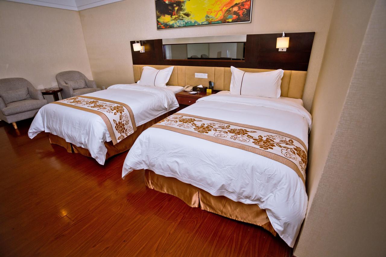 Guangzhou Ming Xin Hotel Bagian luar foto
