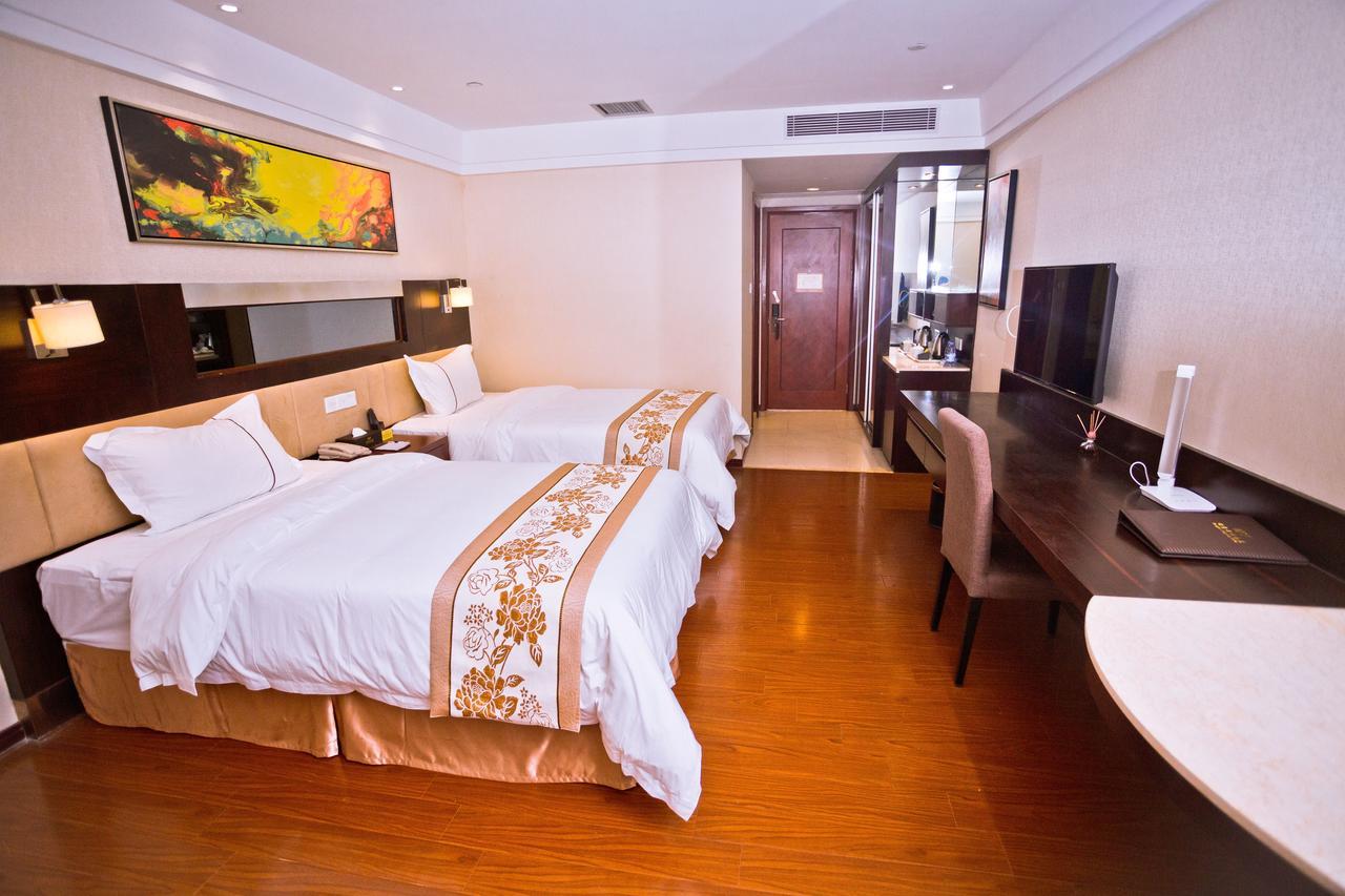 Guangzhou Ming Xin Hotel Bagian luar foto